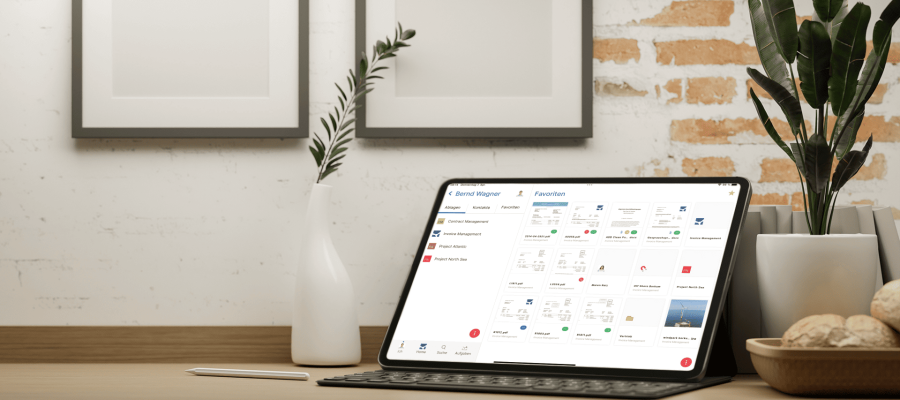 ipad-mockup-placed-on-a-wooden-desk-featuring-some-plants-m22118-r-el2